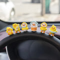 Six yellow PVC duckling ornaments and Hello sign for car dashboard decoration
