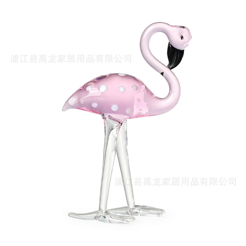 Pink and white crystal decorative flamingo table prop on a modern shelf