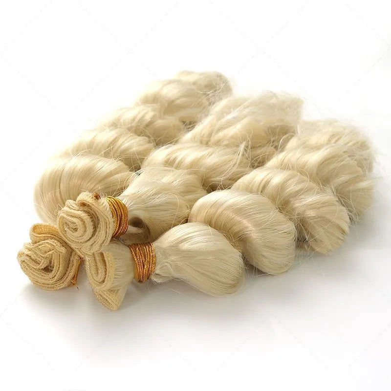 Golden coloured synthetic hair weft wig for women on a stand.