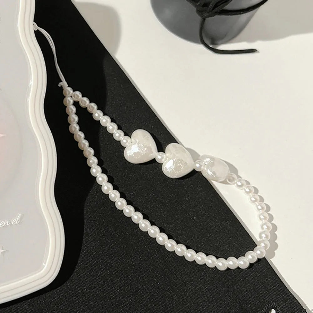 Transparent iPhone case with a raised 3D ice-through bow on a white background.