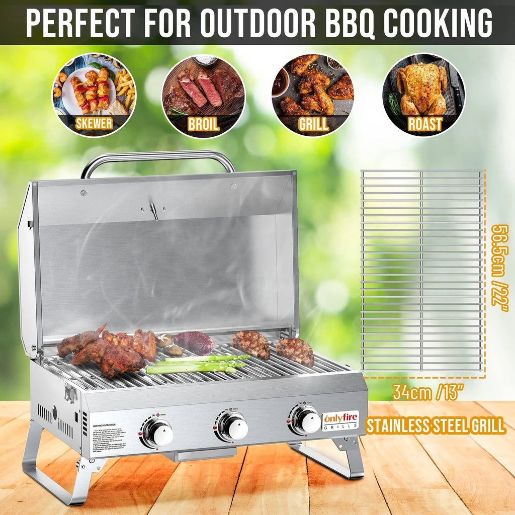Silver desktop gas barbecue grill with three burners and foldable legs
