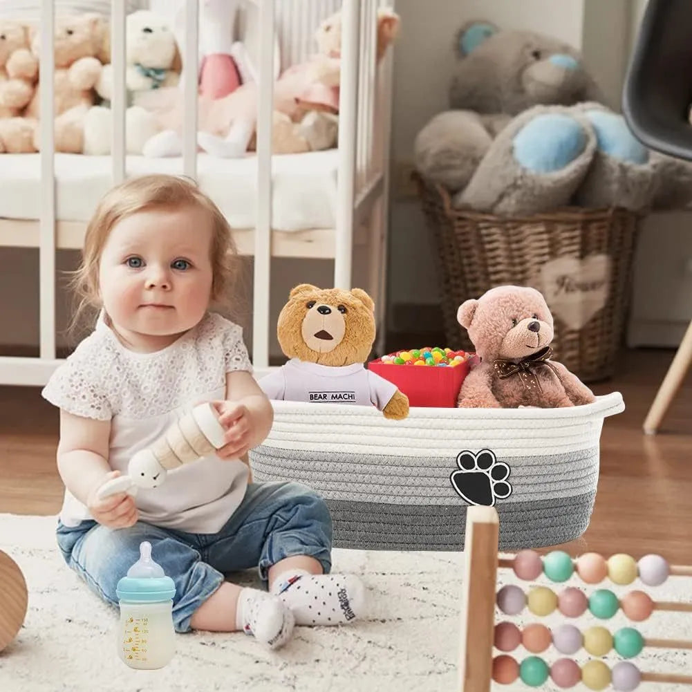 Light beige handmade cotton rope storage basket with handle for nursery toys and home organisation