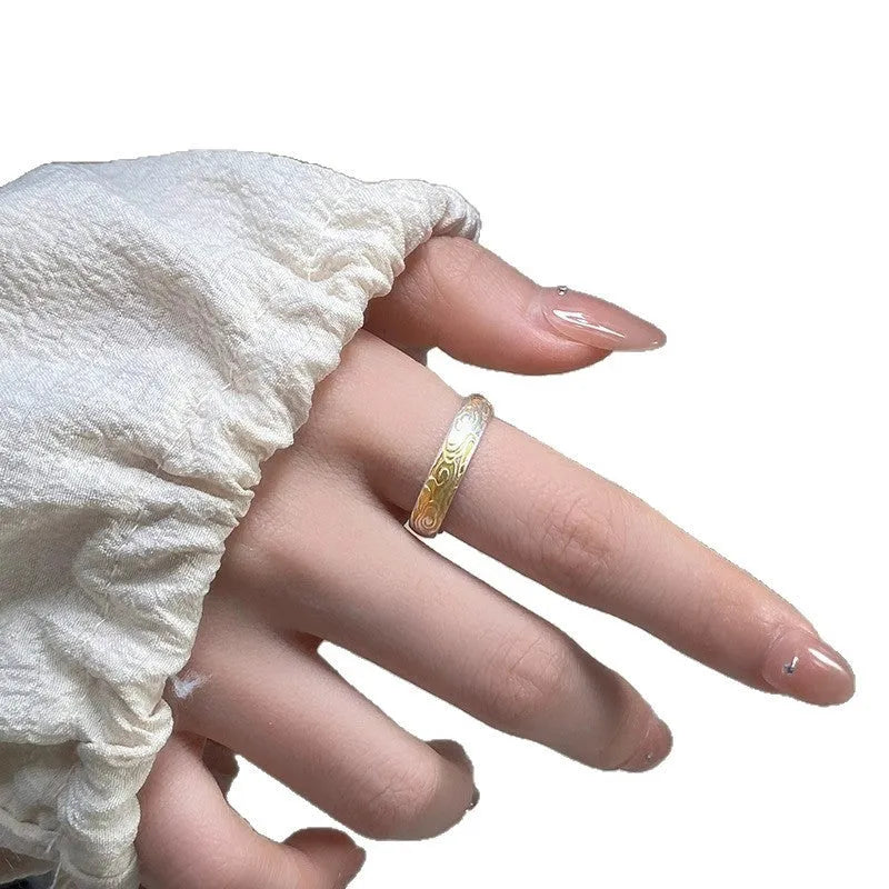 Xiangyun pattern white copper ring with silver gold electroplated finish and geometric open mouth design