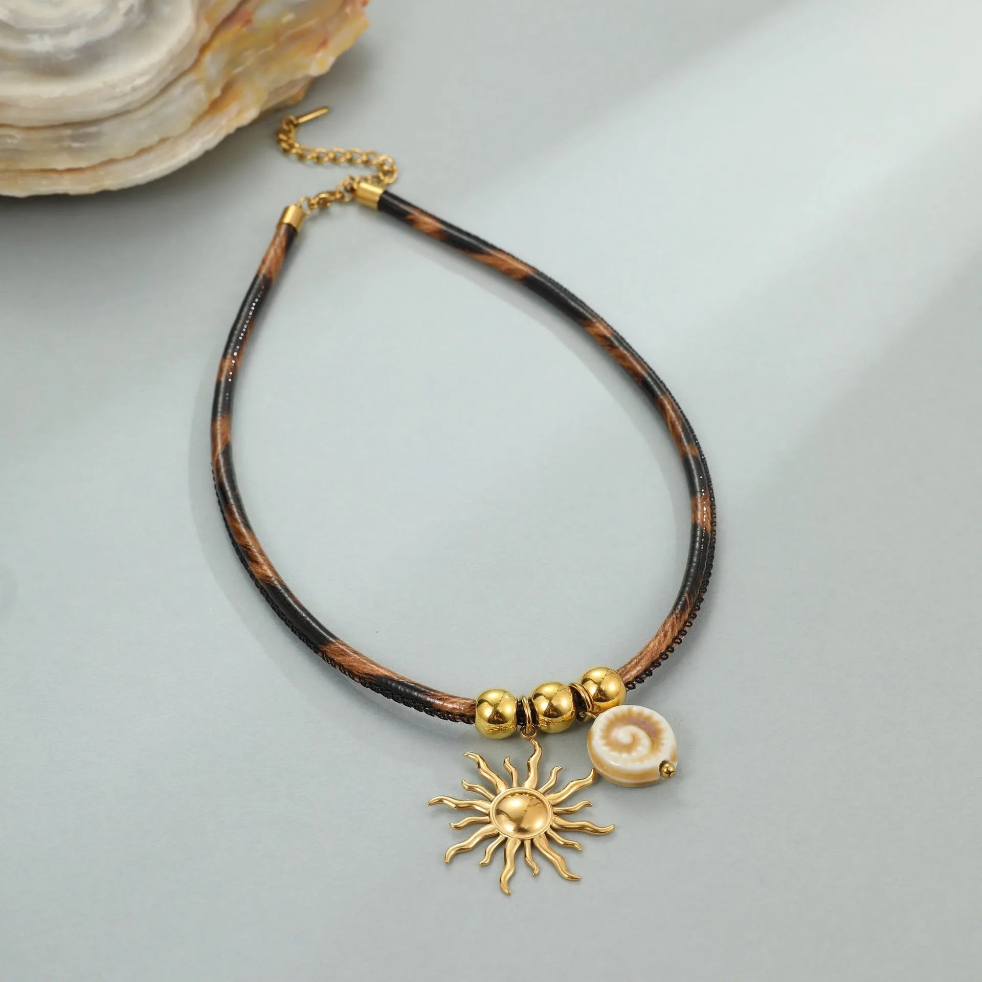 Leopard print geometric pendant necklace on stainless steel chain with adjustable length