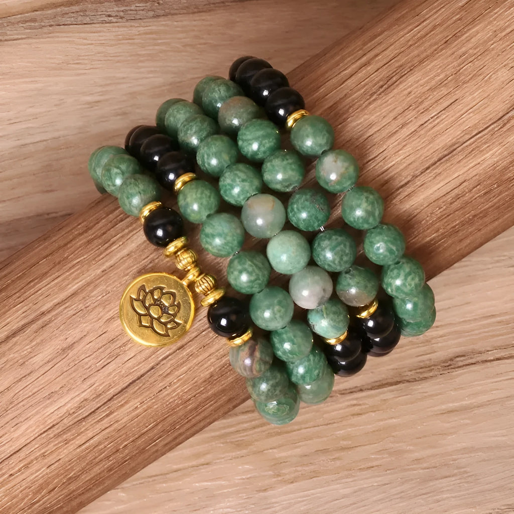 Green and black alloy elastic beaded long bracelet showing stretch design and personality-themed elements