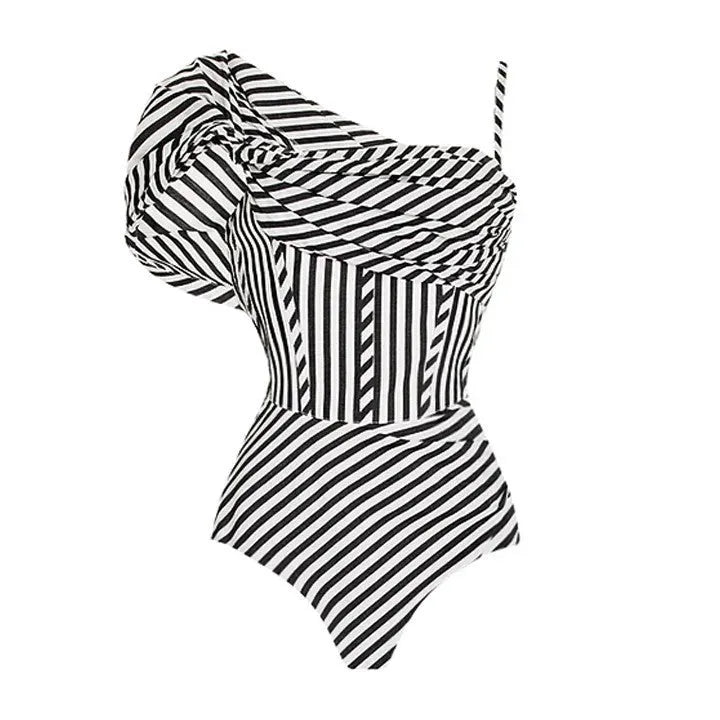 Women's striped one-piece swimsuit with ruffled detailing and black skirt attachment