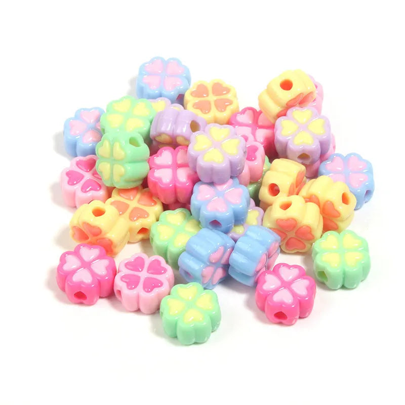 Acrylic four-leaf clover love beads with frosted finish in assorted light colours, 15mm size