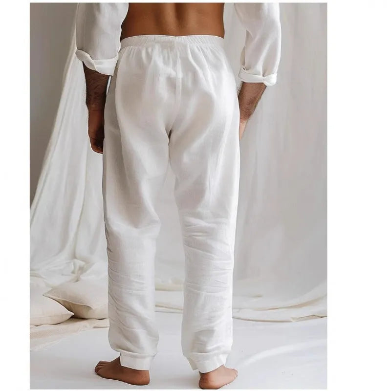 Men's loose fit summer trousers in light blue with elastic waistband and straight leg opening