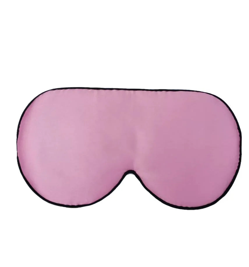 Double-sided mulberry silk sleep eye mask with embroidered printed pattern in various colours.