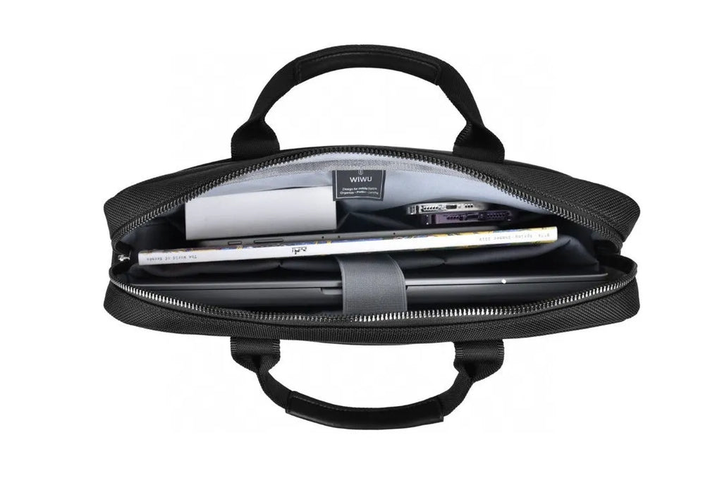 Black oxford cloth laptop handbag showing multi-pocket interior and separate padded computer compartment.