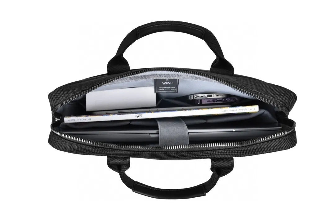 Black oxford cloth laptop handbag showing multi-pocket interior and separate padded computer compartment.