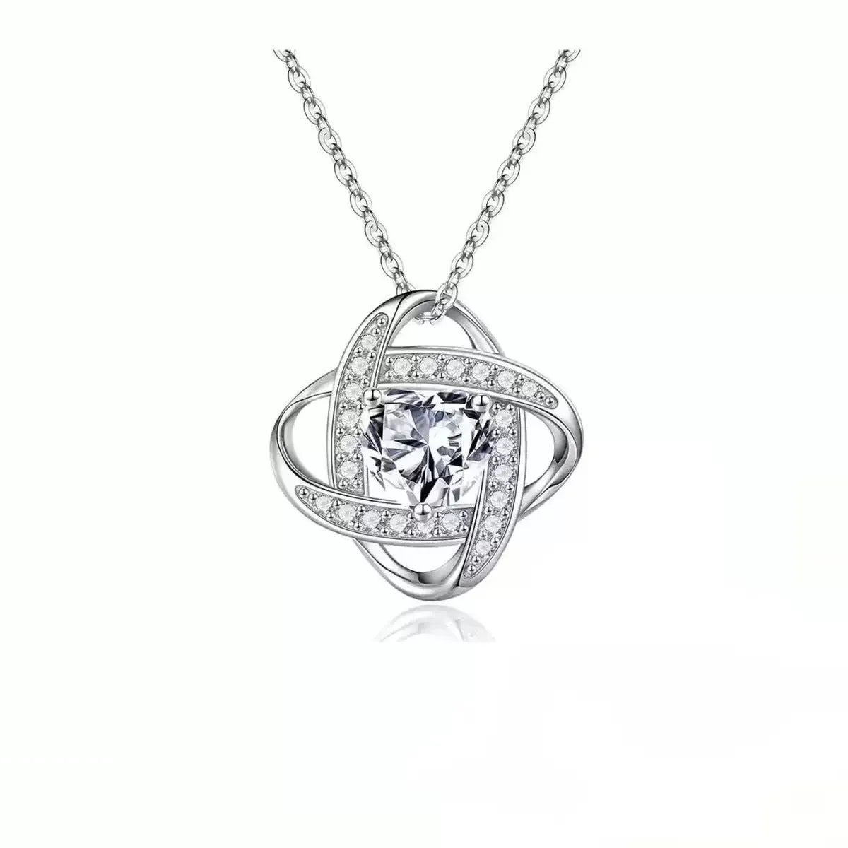Copper heart necklace with electroplated platinum finish in five colour variations on model