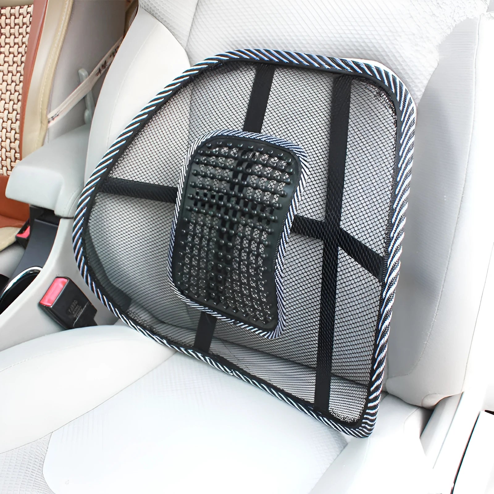 Black leather-look car lumbar support pillow measuring 41 by 39 centimetres.