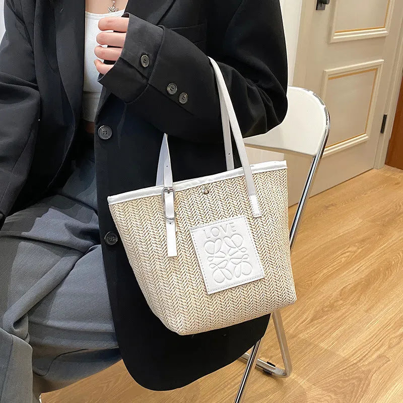 Women's woven straw shoulder bag in European retro style with three-dimensional pockets