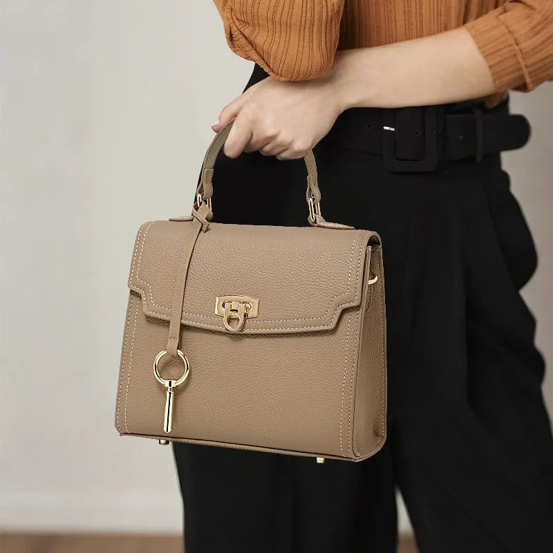 Elephant grey genuine leather crossbody bag with vintage lock and litchi pattern texture