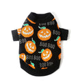 Black Halloween dog sweater with orange pumpkin pattern shown on model dog