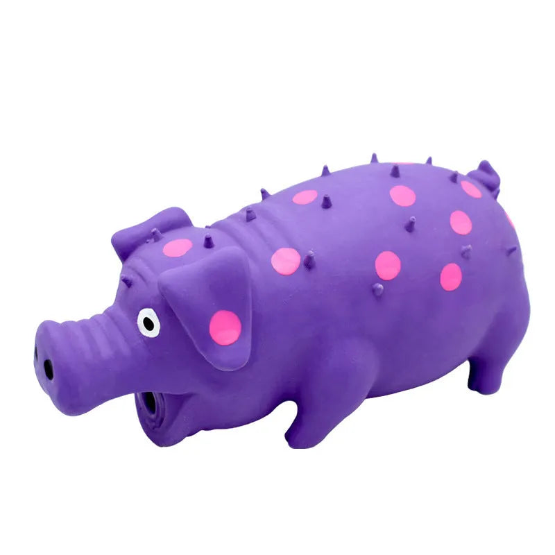 Pig-shaped squeaky dog chew toy in assorted colours for aggressive chewers
