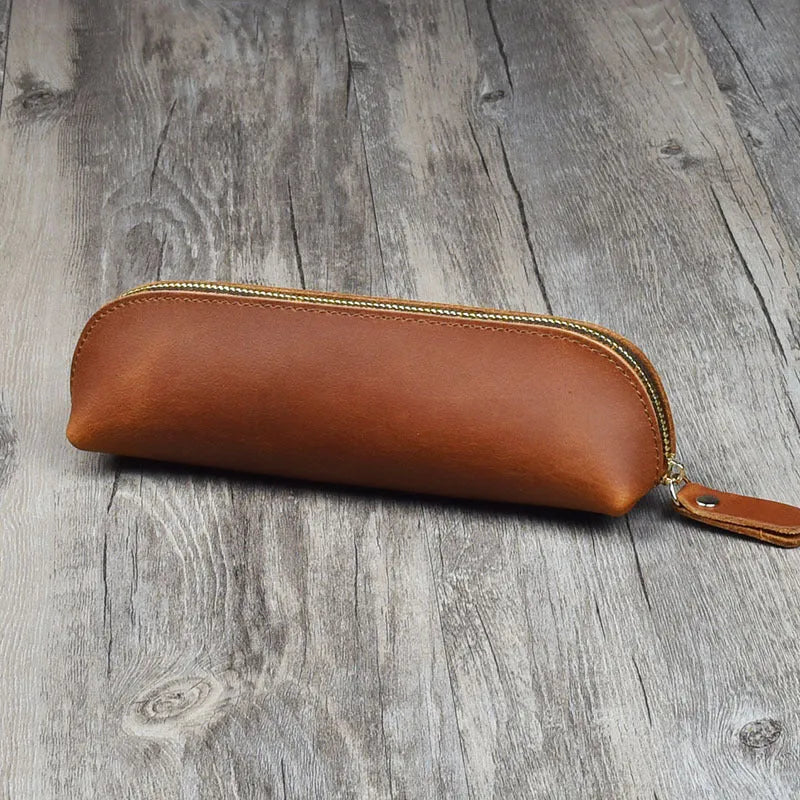 Genuine cowhide leather pencil case with zipper closure in square design measuring 18cm