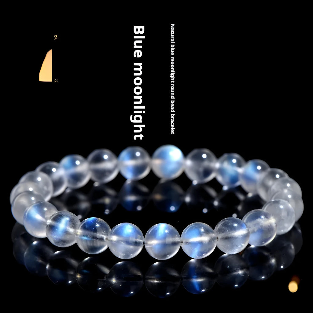 Natural cream body blue moonlight crystal bracelet shown in a simple unisex design on a wrist.