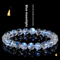 Natural cream body blue moonlight crystal bracelet shown in a simple unisex design on a wrist.