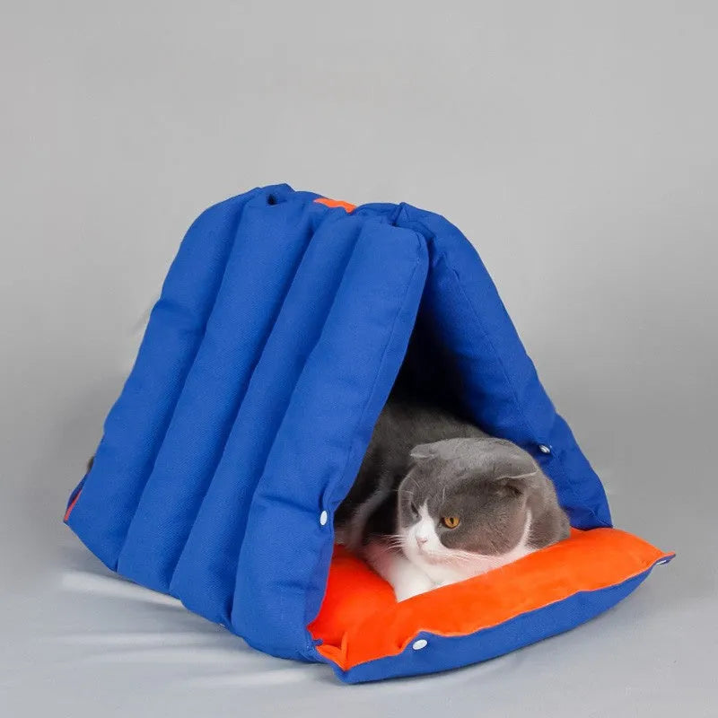 Blue triangular sofa-style cat bed with a removable cover and connection holes on the side.