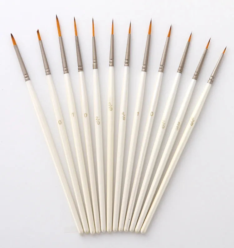 Pearl white fluorescent art marker set with 12 nylon wool brushes in a solid wood holder.
