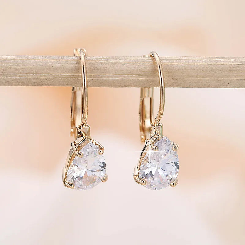 Drop-shaped women's copper earrings with platinum inlaid gems in gold colour option