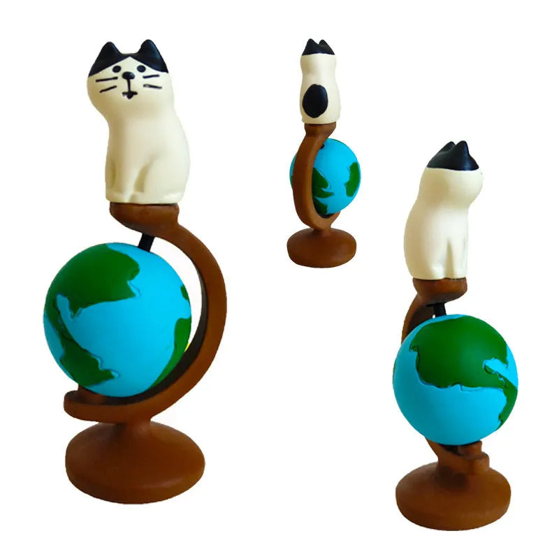 Cartoon Cat of Liberty resin statue on display in Earth Instrument or Carp Cat design style.