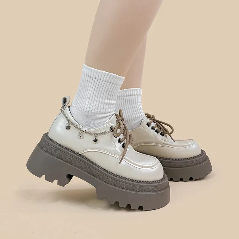 White platform Mary Jane shoes with round toe, lace-up front, and chunky 6-8cm heels