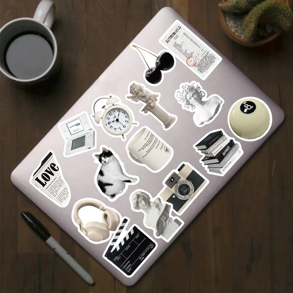 61-piece pack of black and white PVC waterproof decorative stickers for laptops and bottles.