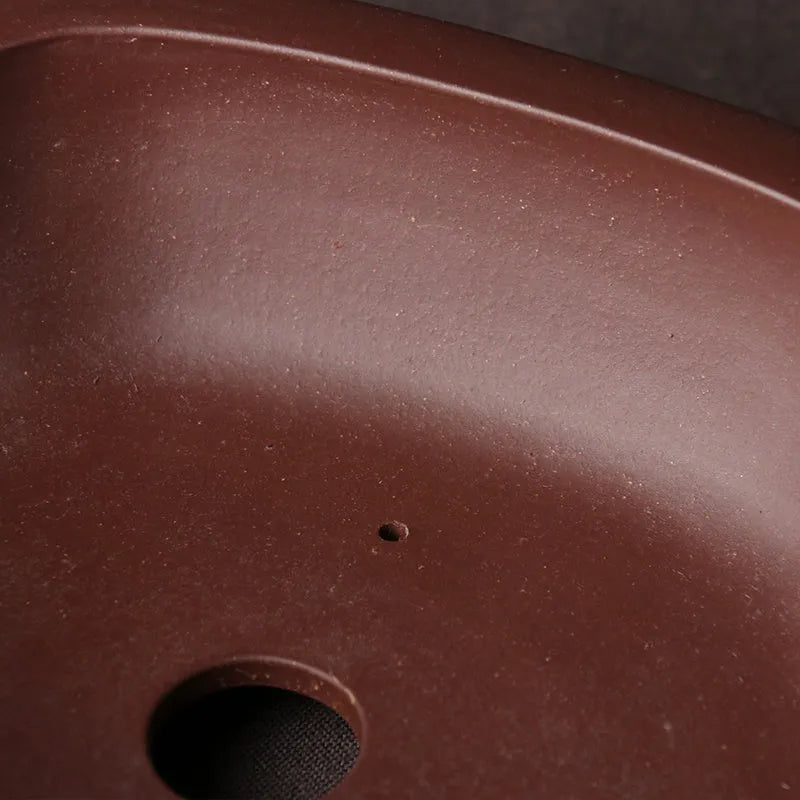 Handmade purple clay Chinese style bonsai basin measuring 25cm by 20cm by 7cm