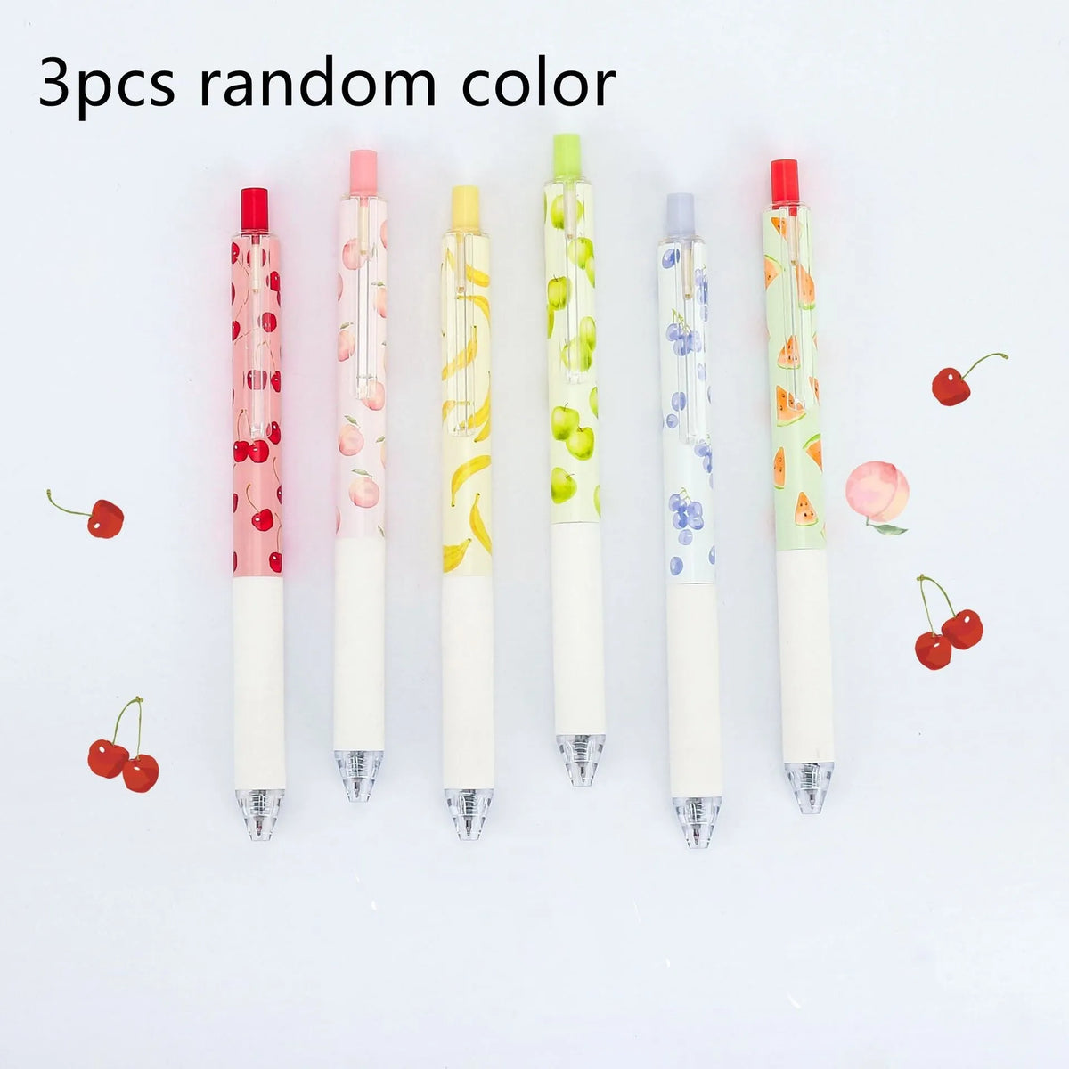 Three fruit scented press-action pens with 0.5mm tips and black ink refills
