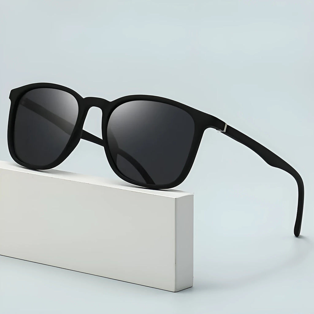 Men's polarised sunglasses with PC frame showing multiple colour options including black and blue frames