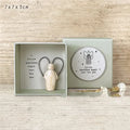 Boxed plastic and resin Guardian Angel ornament in a modern cartoon style, a gift for friends or children.