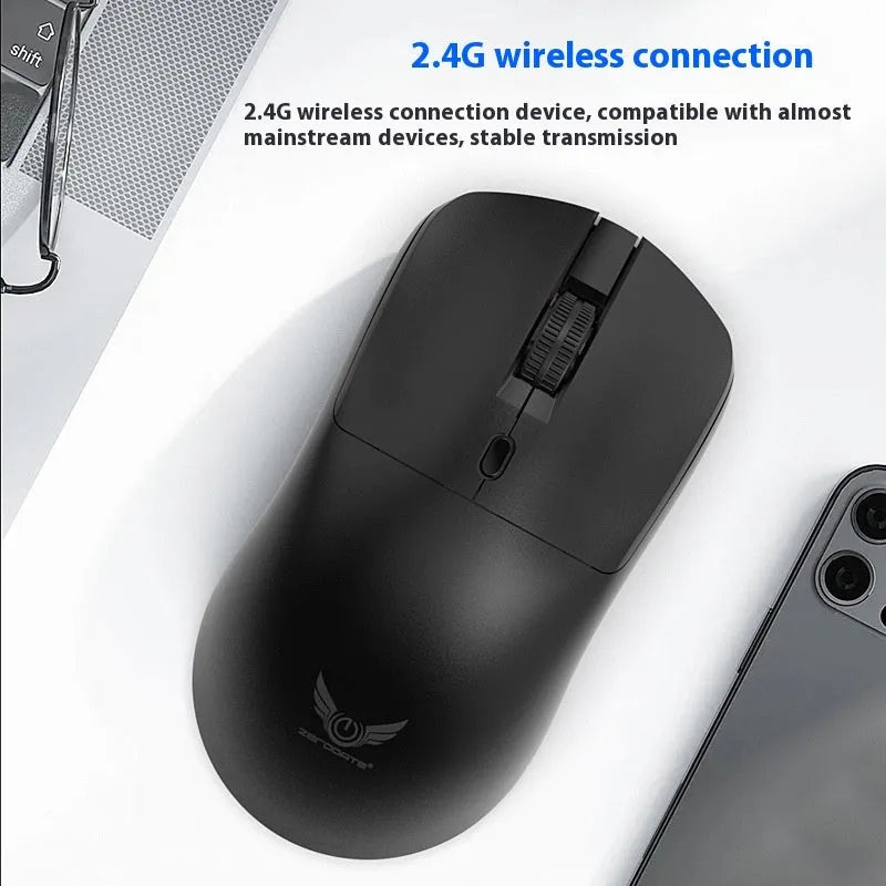 Black wireless computer mouse with three speed settings and battery compartment