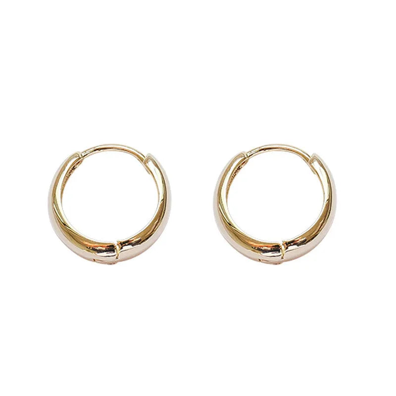 Women's geometric water drop earrings in copper with gold or silver electroplated finish, minimalist retro design.