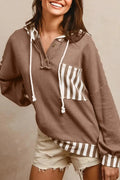 Straw yellow waffle texture hoodie with striped patchwork design, button neck, and drawstring hood.