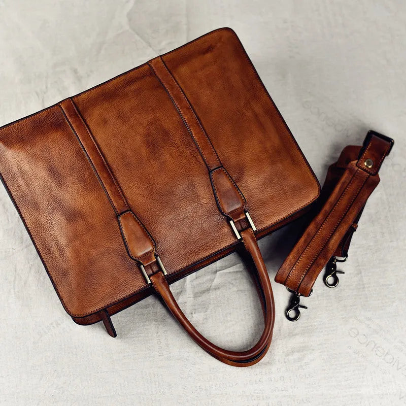 Men's horizontal leather handbag in black or khaki with zipper closure and 14 inch width