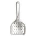Grey plastic cat litter scoop with drainage holes resting on matching base unit