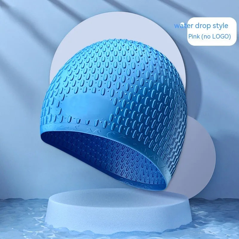 Silicone water drop style swimming cap for adults in various solid colours