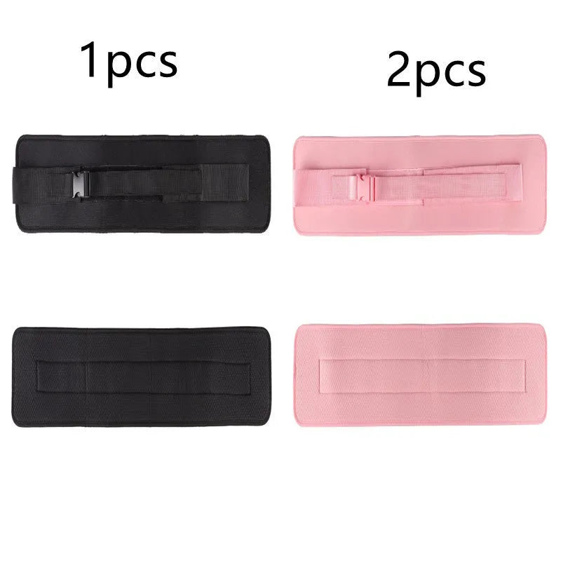 Black fitness training belt with dumbbell strap for hip bridge exercises