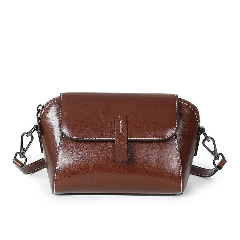 Women's oil wax cowhide shell messenger bag with single shoulder strap and zipper pockets in Avocado Green, Black, Brown, Coffee, Peacock Blue, or Pearl White