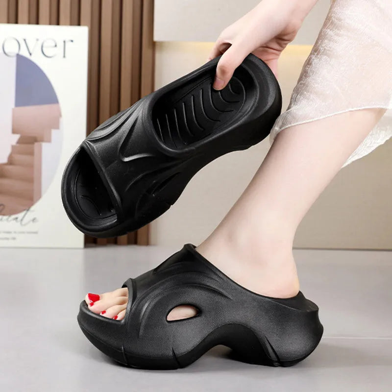 Women's white thick-soled EVA slippers with round toe design for beach use