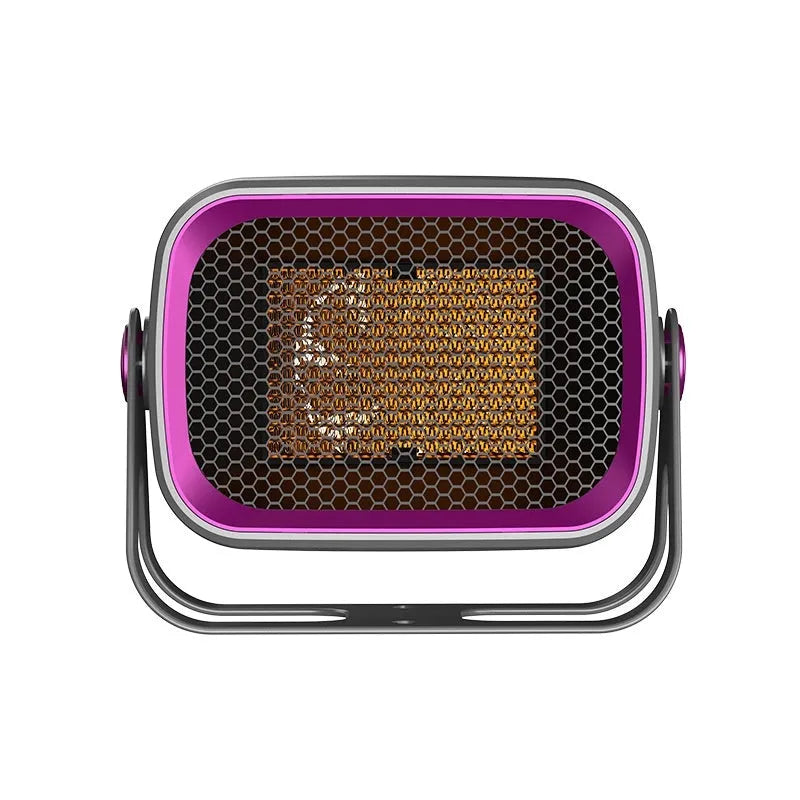 A compact grey desktop electric heater with a rotatable design on a wooden desk.