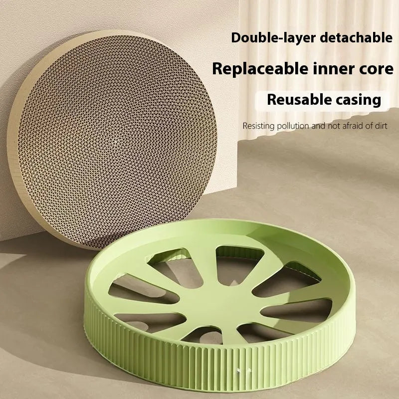 Green round cat scratching board measuring 55cm with white corrugated paper surface and two replacement refills