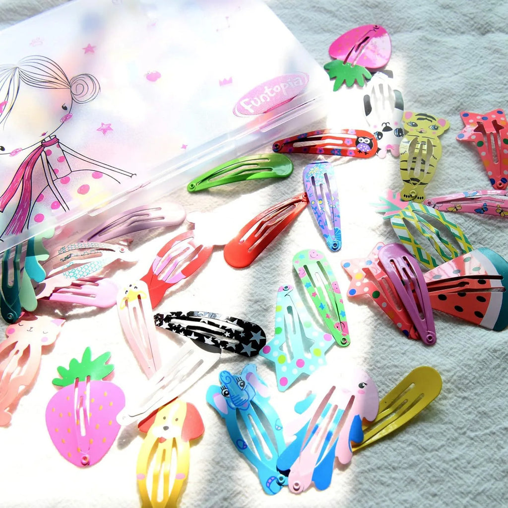 Assortment of 100 metal snap hair clips in candy colours showing animal, fruit, crown, star, and drop shapes.