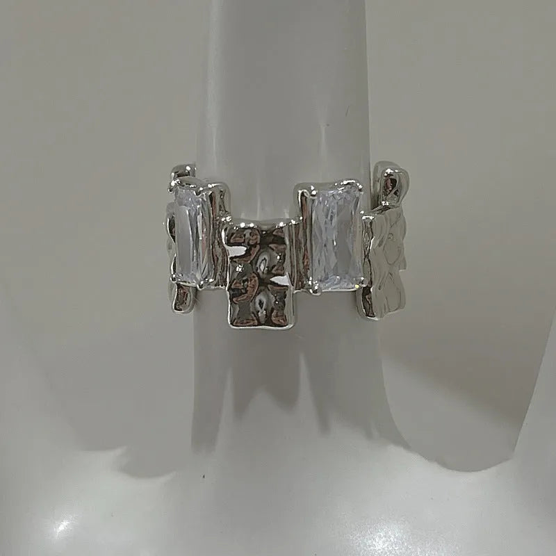 Geometric open silver ring with cross zircon decoration in retro style