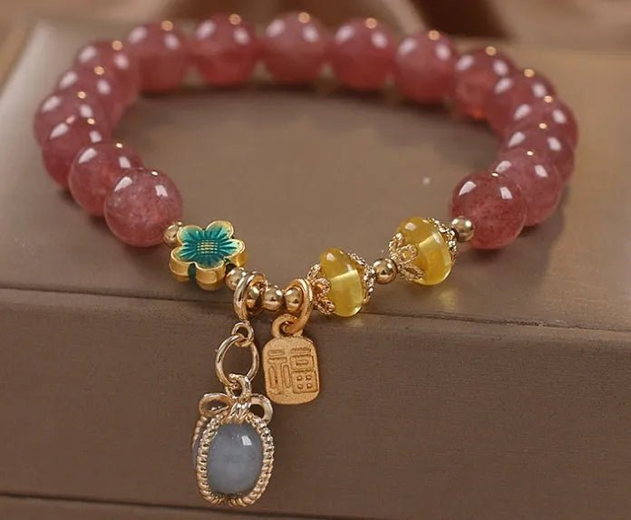 Red strawberry quartz beaded bracelet with alloy metal and rhinestone detailing for women's jewellery