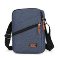 Ultra-light Oxford cloth crossbody commuter bag in solid colour with contrast trim.