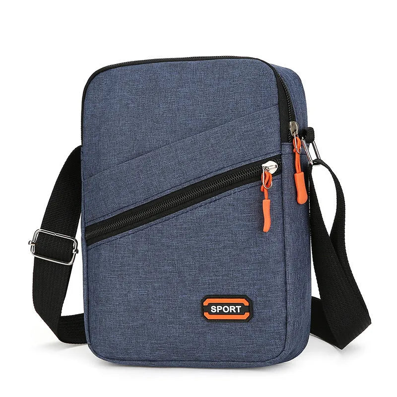 Ultra-light Oxford cloth crossbody commuter bag in solid colour with contrast trim.